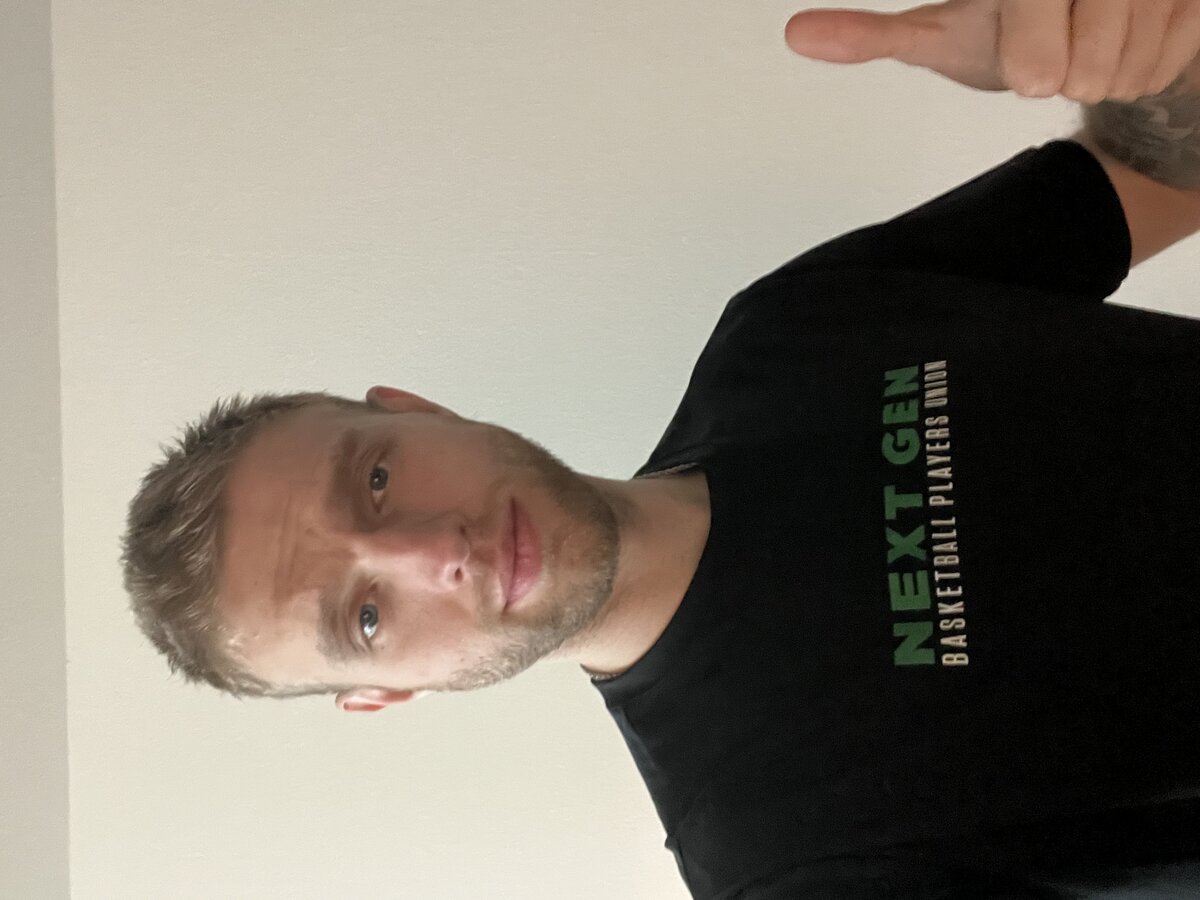 Yauhen with Next Gen Basketball Players Union shirt